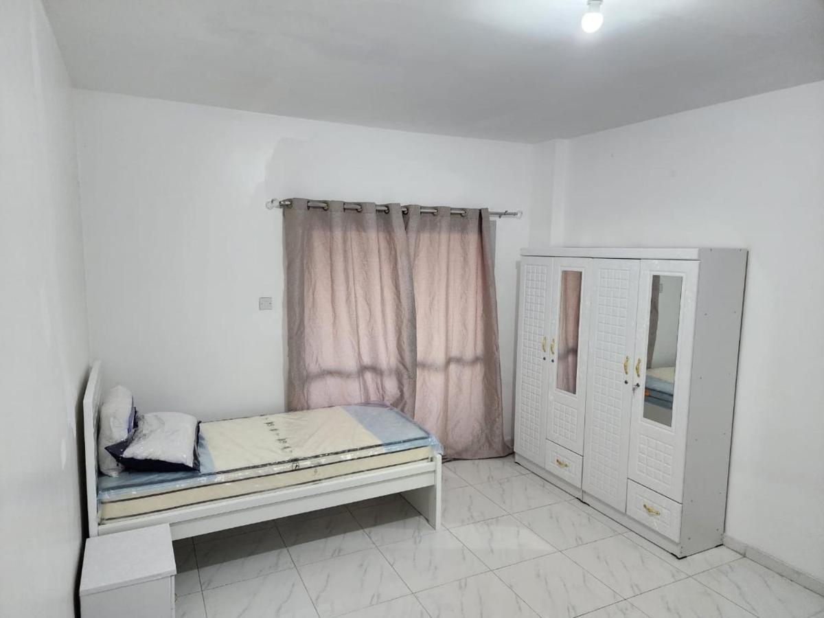 Sharing Motel Rooms อาบูดาบี ภายนอก รูปภาพ