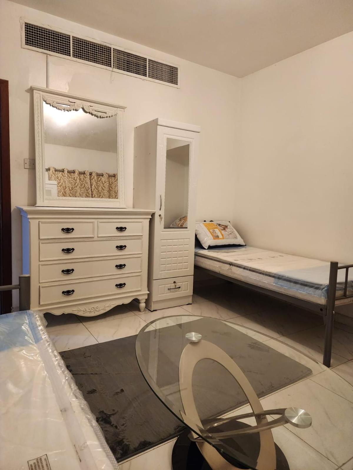 Sharing Motel Rooms อาบูดาบี ภายนอก รูปภาพ